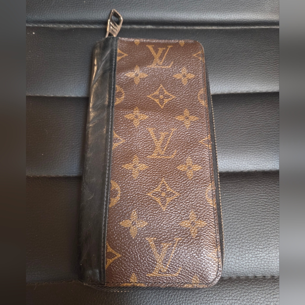Louis Vuitton Vertical Zippy Wallet from the Monogram Macassar Collection